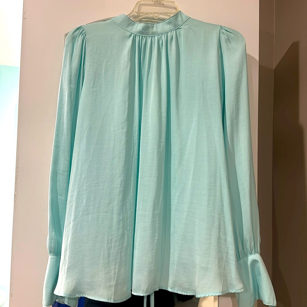 Free People tie back satin-like blouse, drawstring closure on backside.
